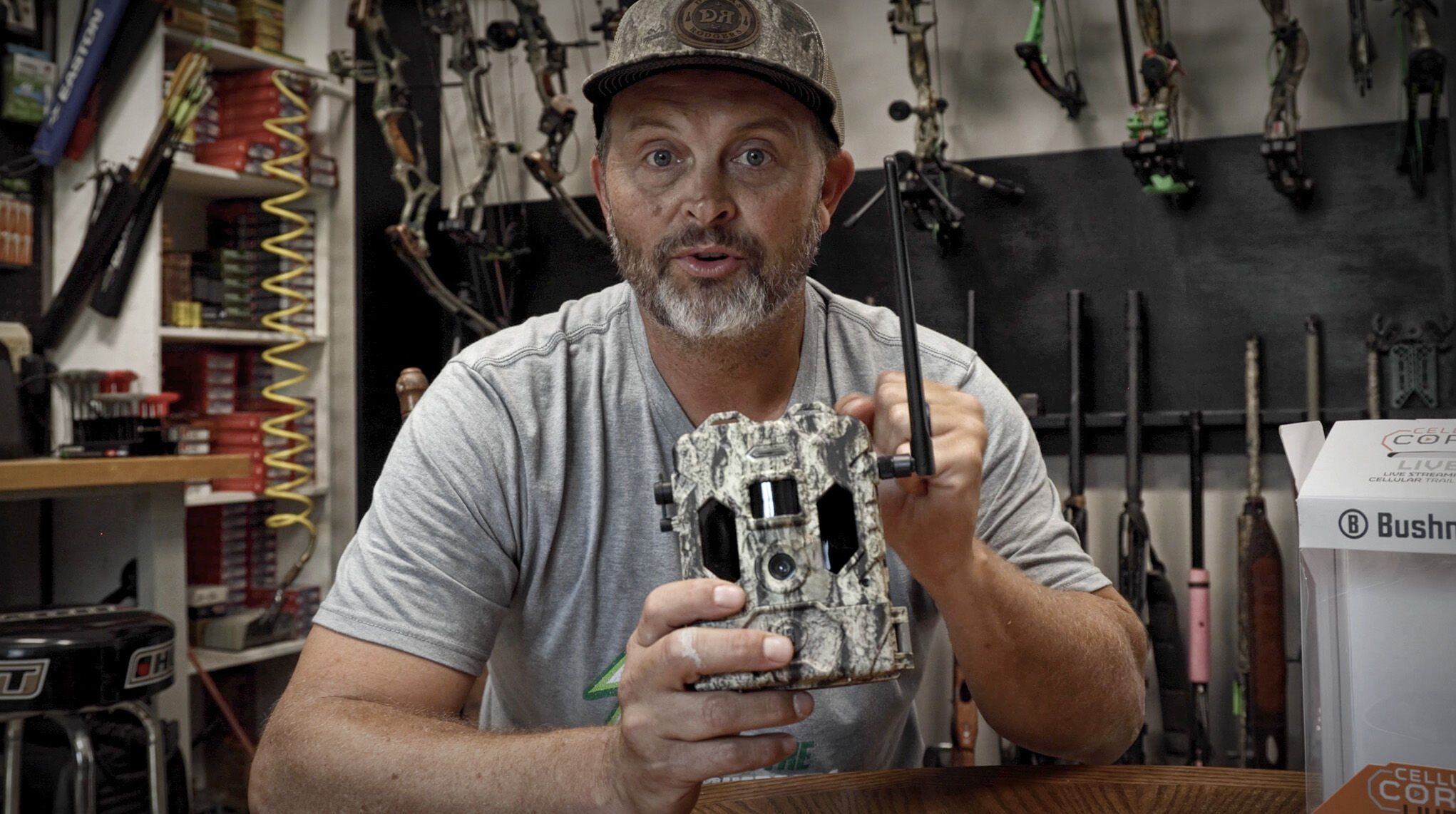 Trail Camera Tips and Tricks Video T-Bone Turner adjusting his bow gear at a workbench