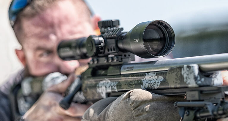Shooter aiming though XRS3 Riflescope Shooter aiming though XRS3 Riflescope